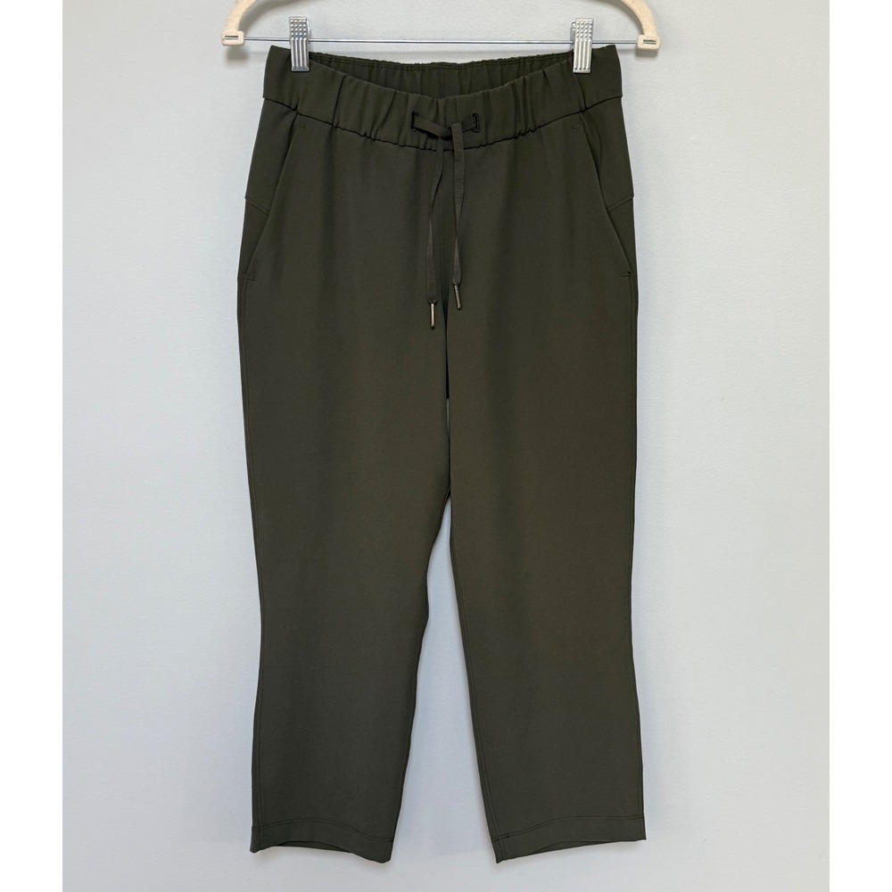 Lululemon Women's On the Fly Crop 23"Pants Dark Olive Green Drawstring Size 4
